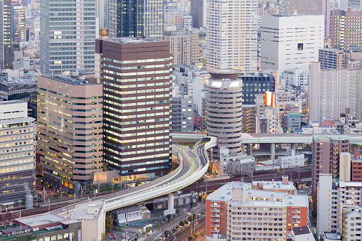 Close up aerial view office building business downtown and highway, Osaka Japan