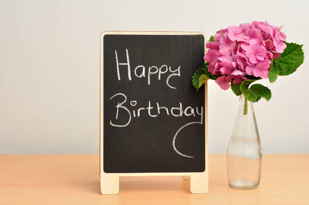 istock A blackboard with a happy birthday message and hydrangeas 655053844