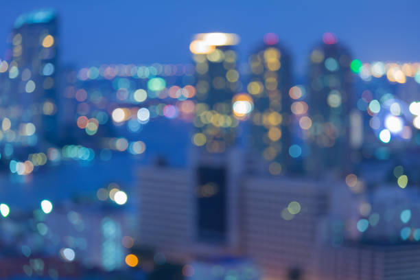 istock Twilight blurred city light business downtown 655061130