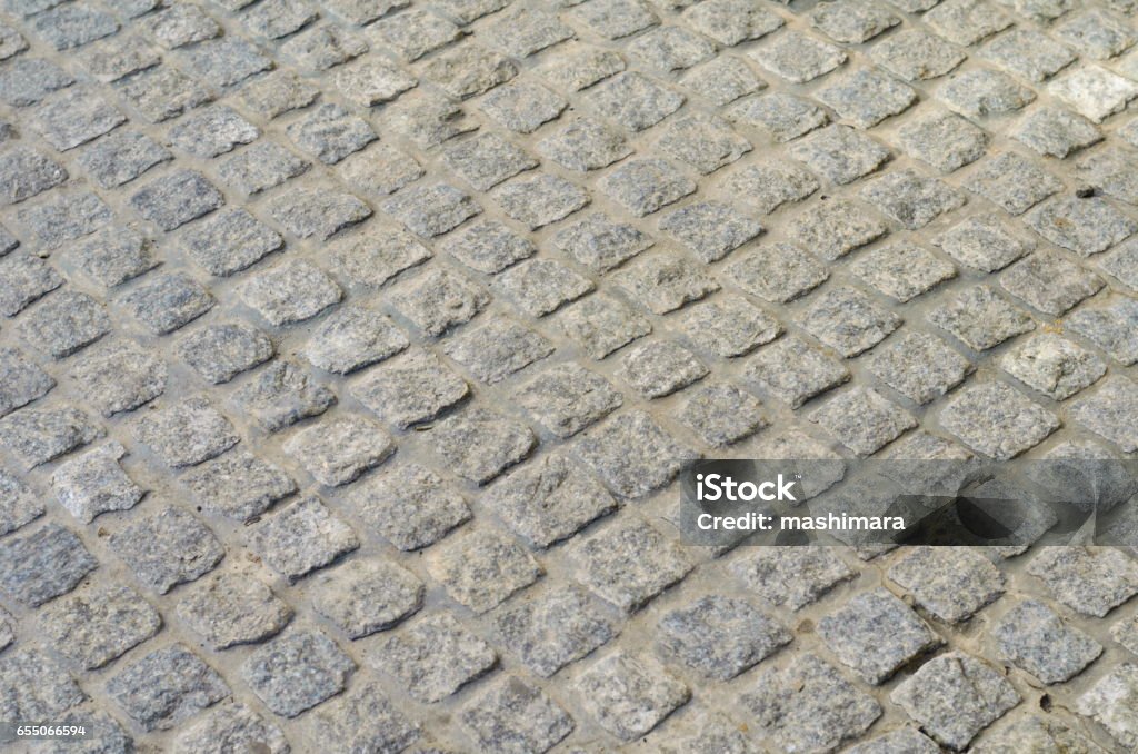 Cobblestone texture, geometry, traditional street pavement Abstract Stock Photo