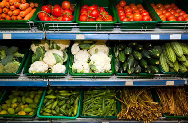 istock Variety of fresh vegetables on display in grocery store 655084736