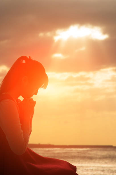 istock woman pray pious 655087386