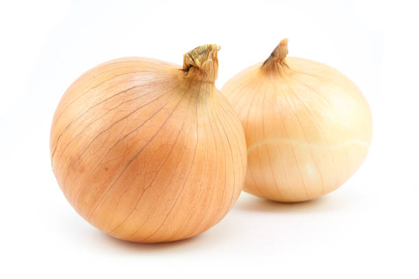 istock fresh bulbs of onion on a white background 655091548