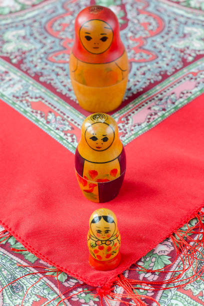 istock Russian nesting dolls on the traditional handkerchief. 655103754