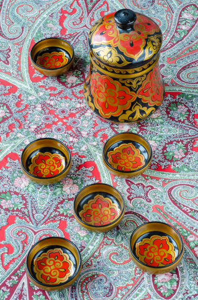 istock Russian traditional Khokhloma dishes on a red handkerchief 655103786