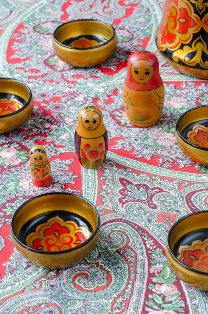 Russian nesting dolls on the traditional handkerchief.