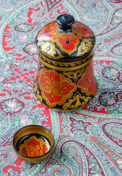 istock Russian traditional Khokhloma dishes on a red handkerchief 655103798
