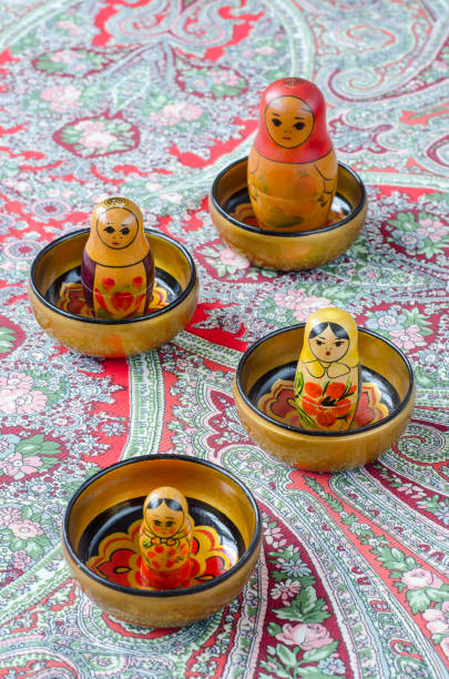 istock Russian nesting dolls on the traditional handkerchief. 655103808