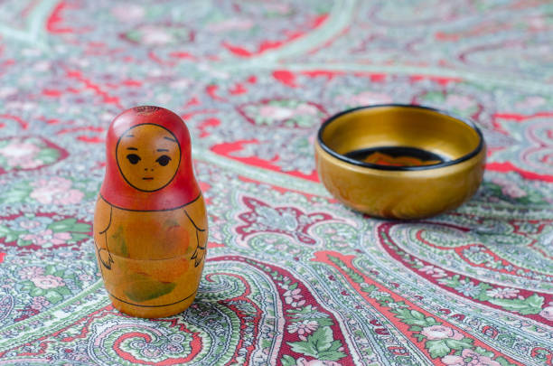 istock Russian nesting dolls on the traditional handkerchief. 655103810