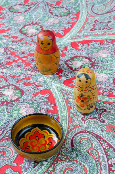 istock Russian nesting dolls on the traditional handkerchief. 655103824