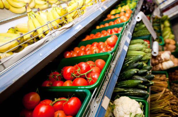 istock Various vegetables and fruits on display in supermarket 655108408