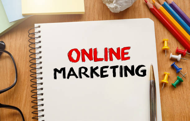 istock Notebook with Toolls and Notes about Online Marketing 655108654