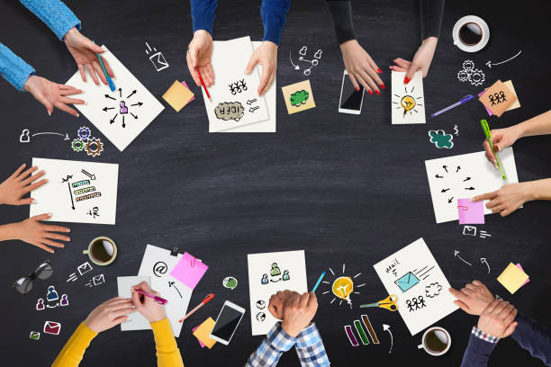 istock Business people group meeting at a blackboard table 655108846