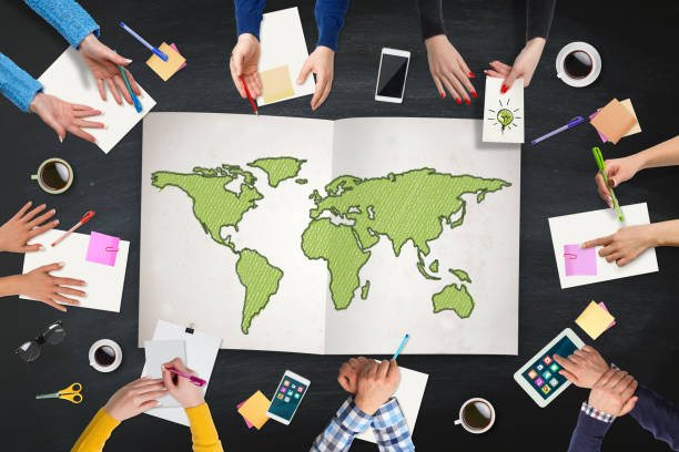 istock Business people meeting with World map on table 655108888