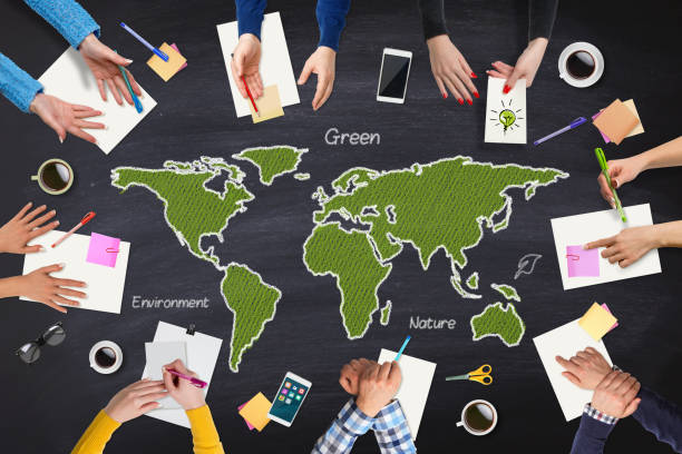 istock Business people meeting with Green World map on table 655108988
