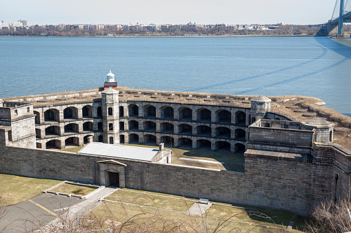 The Battery Weed at Fort Wadsworth on Staten Island is seen with Brooklyn in the Background.