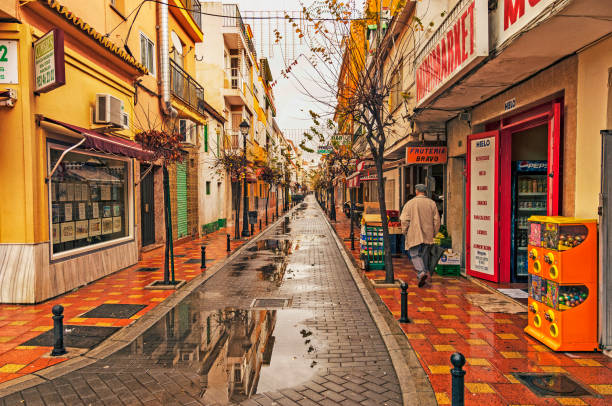 Fuengirola Man walking in Shopping District stock photo