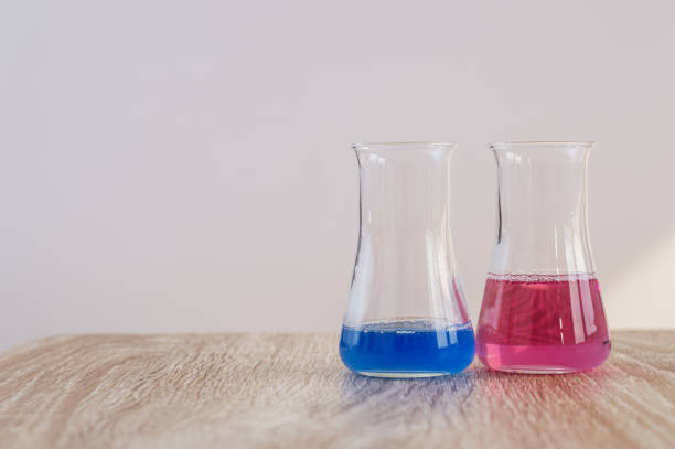 istock Laboratory glassware with liquids of different colors 655127170
