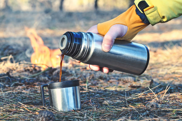 istock Thermos bottle outdoor near the campfire 655133062