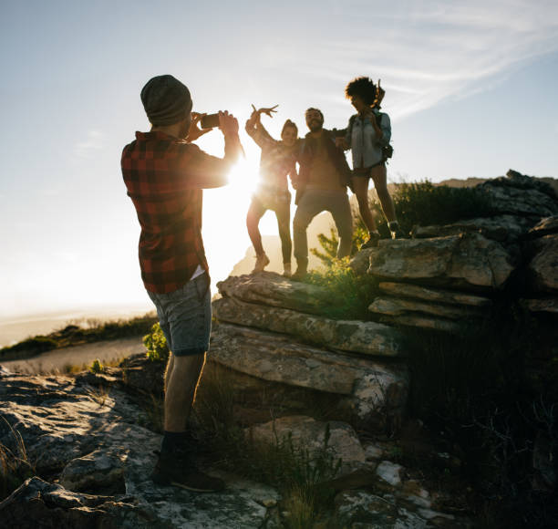 istock Friends on hike together in the countryside 655137946