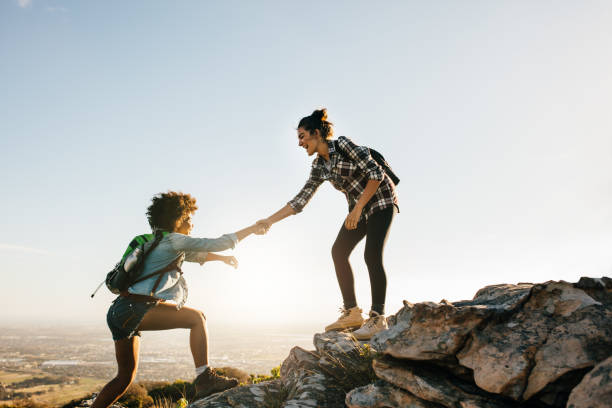 istock Two young women hiking in nature 655140562