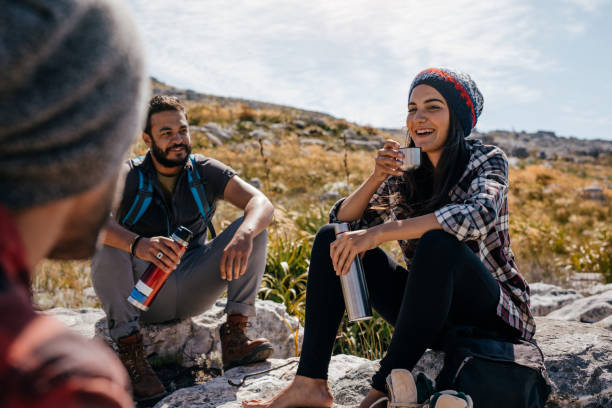 istock Young hikers relaxing and having coffee 655140602