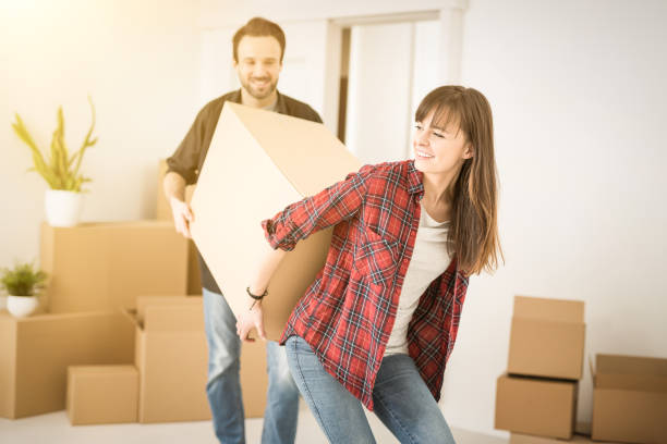 istock A young couple is introduced into a new apartment. 655144496