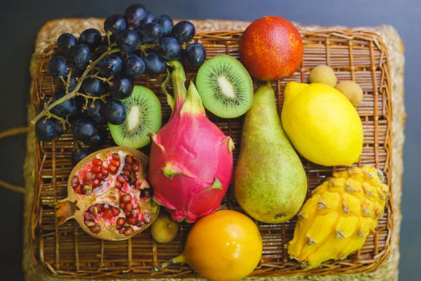 istock Mix of fresh fruits on wicker bascket 655150098