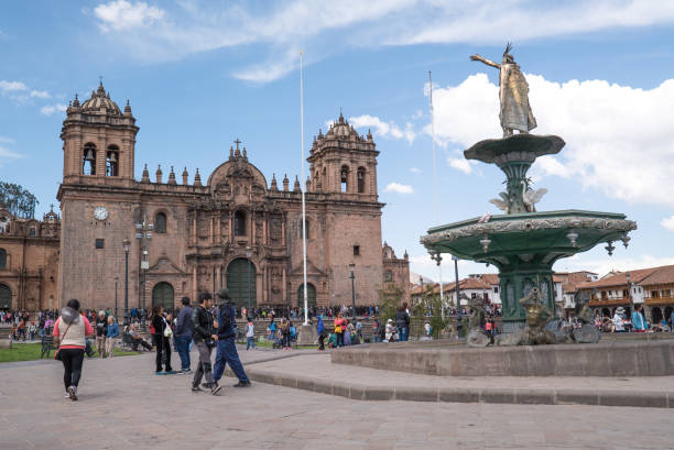 Cathedral of Cuzco Cathedral del Cuzco, with fountain in Cuzco Peru Sept 29th 2016 vakantie stock pictures, royalty-free photos & images
