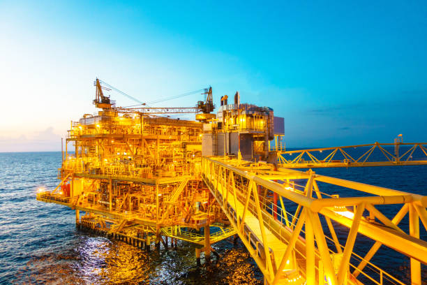 istock Offshore construction platform for production oil and gas with bridge in evening time 655162742