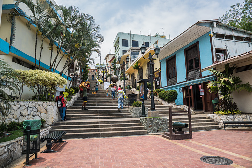 Guayaquil, Ecuador - September 17, 2016: locals and tourists walking up and down the Stairs of Guayaquil mountain of Las Peñas