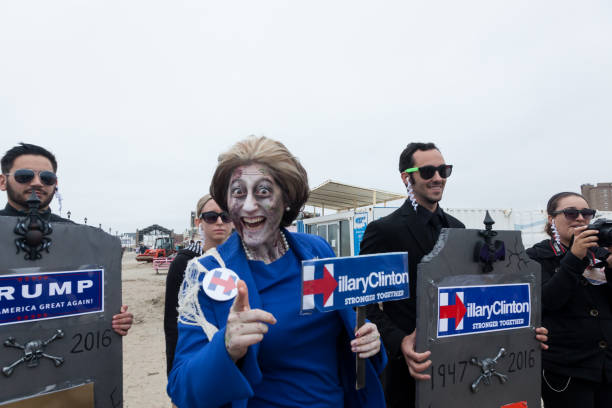 Asbury Park Zombie Walk 2016 ASBURY PARK, NEW JERSEY - October 1, 2016: Zombies take over the Asbury Park Boardwalk during the 2016 New Jersey Zombie Walk hillary clinton stock pictures, royalty-free photos & images