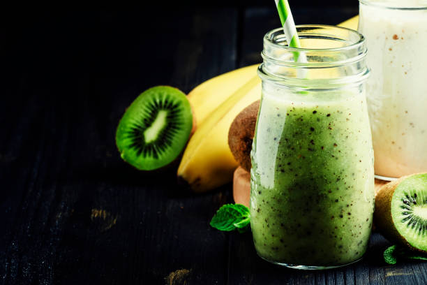 istock Kiwi and banana smoothies in bottles 655173846