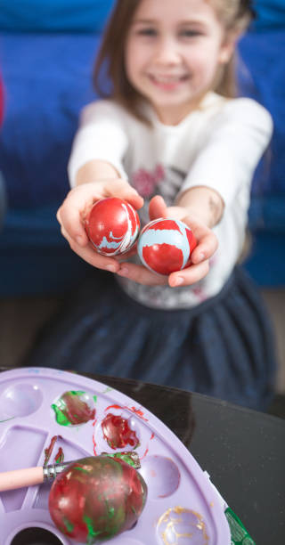 istock giving colorful painting eggs, Happy Easter 655178496