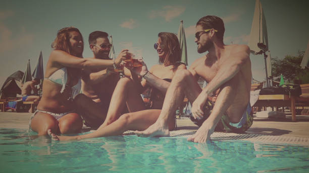 istock Friends chilling at the pool 655191030