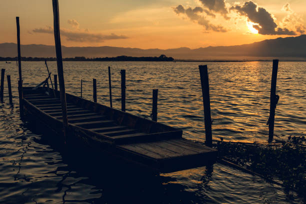istock Silhouette boat in the lake 655193300