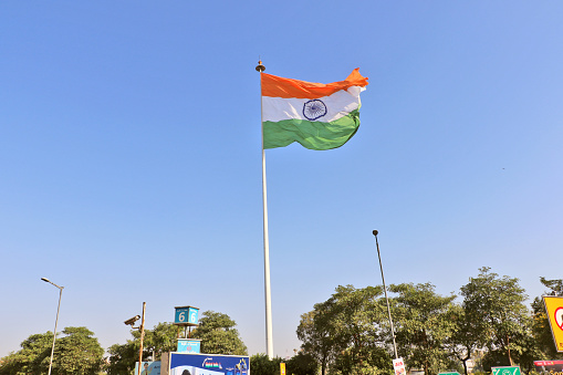 New Delhi, India - February 24, 2017: This flag Tiranga, the national flag of India hoisted at Rajiv Chowk, New Delhi is one of the highest national flags of India.