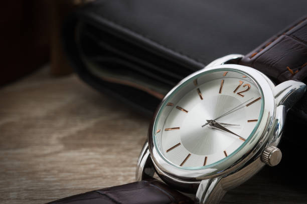 istock Close up watch and wallet 655242954