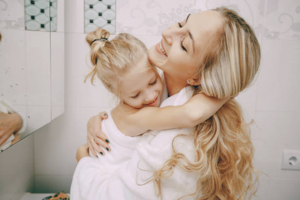 istock family in the bathroom 655246204