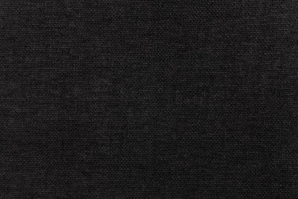 black background from textile material. fabric with natural texture. backdrop. - burlap textured textured effect textile imagens e fotografias de stock