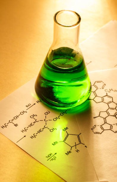 istock Chemical tube with reaction formula 655262720