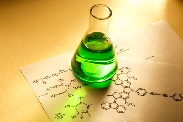 istock Chemical tube with reaction formula 655262878