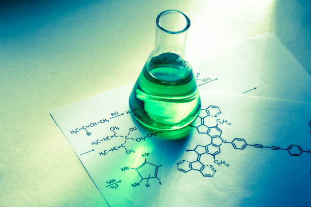 istock Chemical tube with reaction formula 655263274