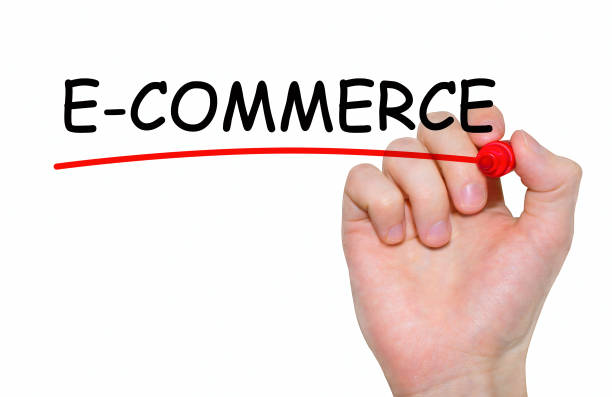 istock Hand writing E-commerce with red marker on transparent wipe board. 655263498