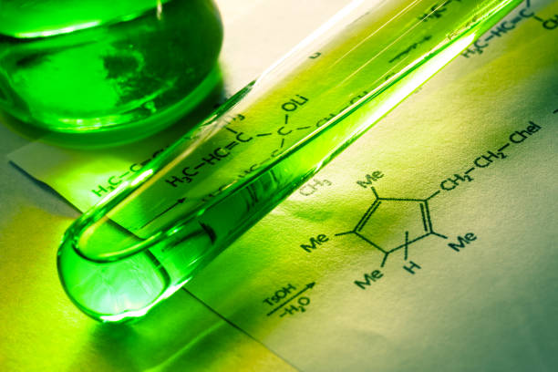 istock Chemical tubes with reaction formula 655263892
