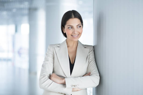 istock Charming Business Woman Standing in Office Hall 655266406