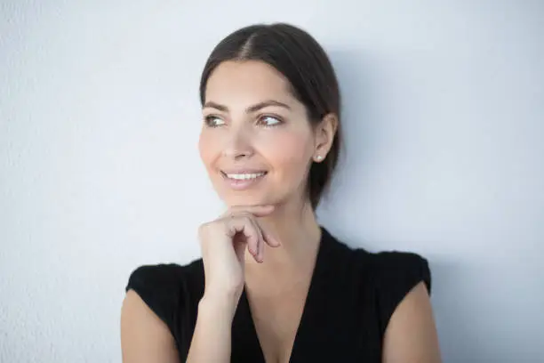 Photo of Closeup of Smiling Pensive Gorgeous Business Woman