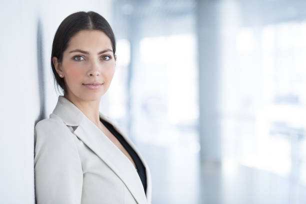 istock Confident Business Lady Leaning on Wall in Hall 655266440