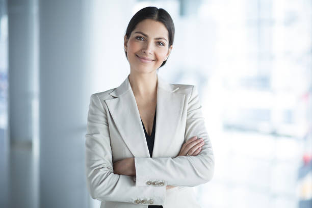 istock Smiling Attractive Business Lady in Office Hall 655268550