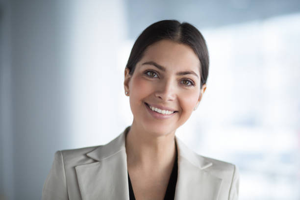 istock Smiling Pretty Business Lady Looking With Interest 655268590